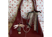 red coquette bag