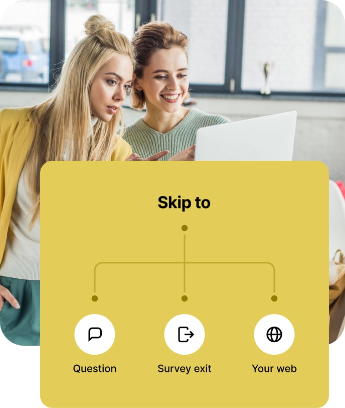 Two women filling in a questionnaire on a laptop.