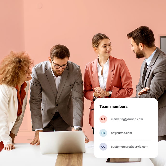 Team members discussing survey results in a meeting room