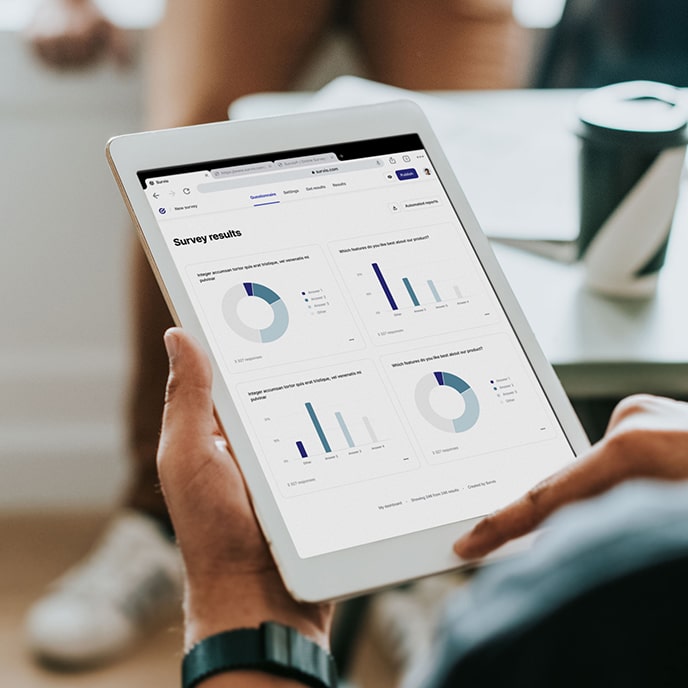 Tablet showing survey results in a BI dashboard